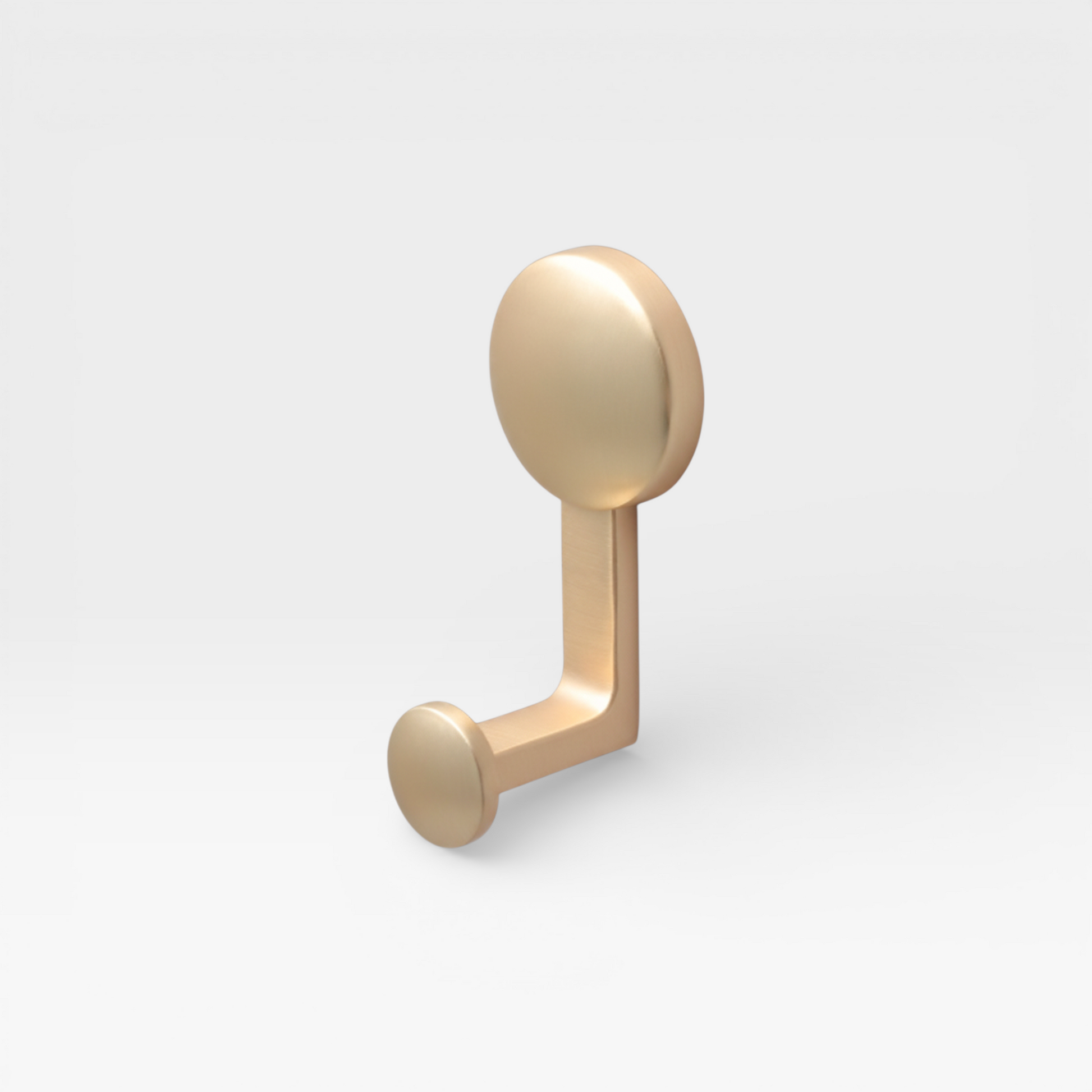 Brushed Brass Olo wall hook by Plook Design - statement hook for hallways